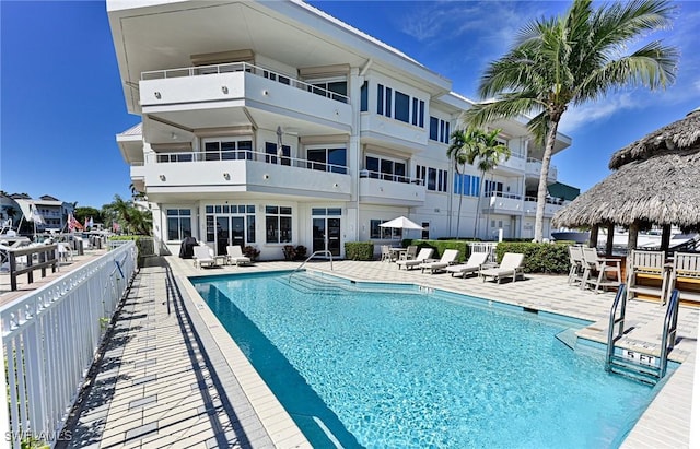 view of pool with a gazebo and a patio