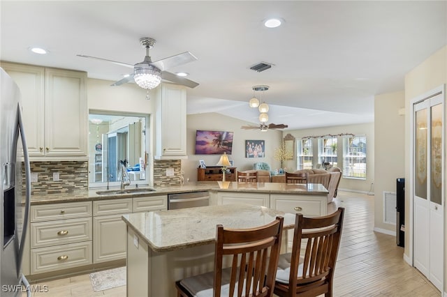 403 SE 28th Ter, Cape Coral, FL 33904 - kitchen with visible vents, ceiling fan, a sink, and appliances with stainless steel finishes