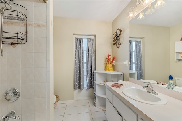 403 SE 28th Ter, Cape Coral, FL 33904 - bathroom with tile patterned floors, vanity, and walk in shower