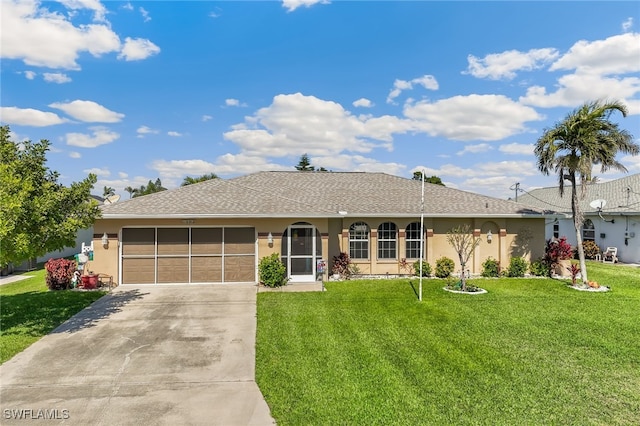 single story home featuring a garage and a front yard