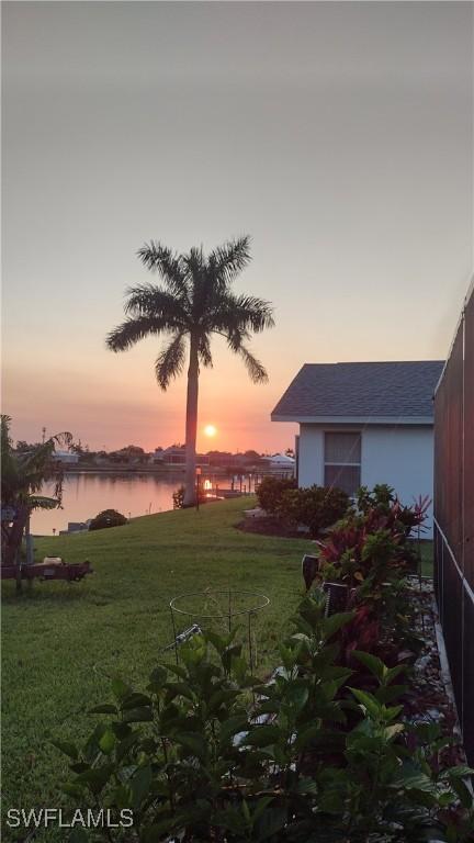 403 SE 28th Ter, Cape Coral, FL 33904 - view of yard featuring a water view