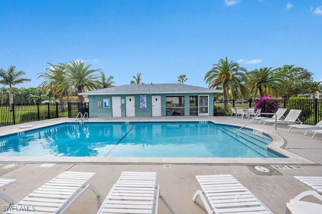 view of swimming pool with a patio area