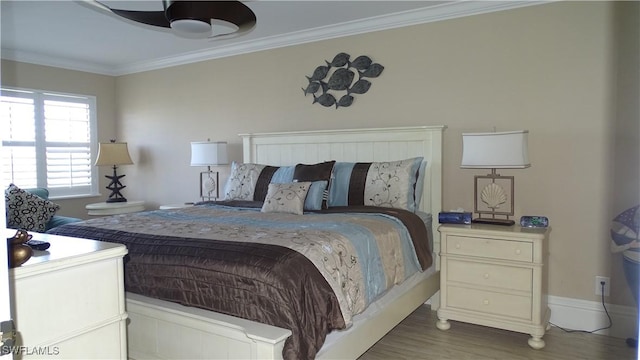 bedroom featuring ornamental molding and dark wood-type flooring