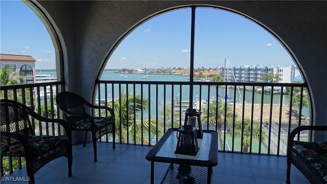 balcony featuring a water view