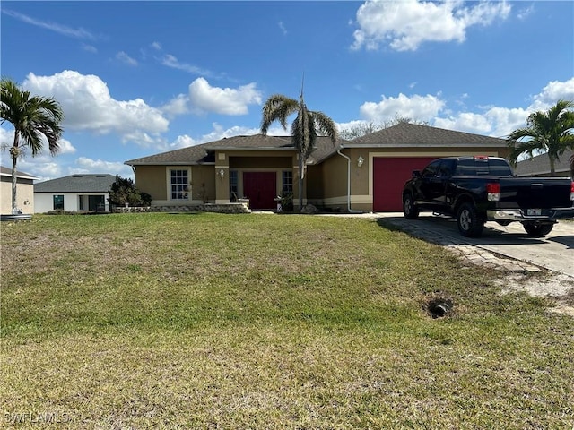 ranch-style house featuring a garage and a front lawn