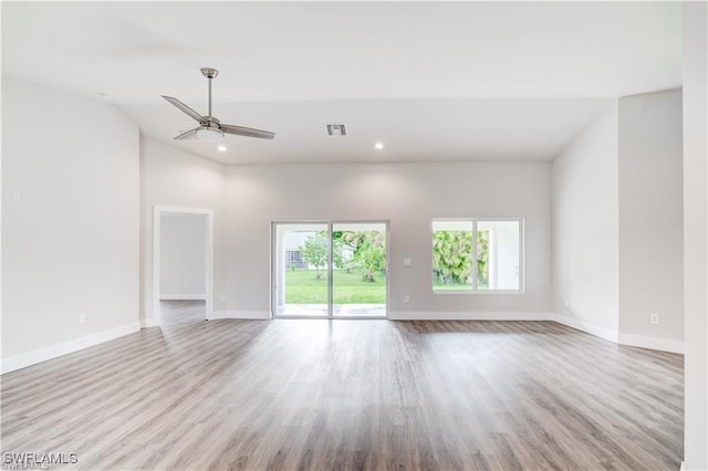 empty room featuring light hardwood / wood-style floors and ceiling fan