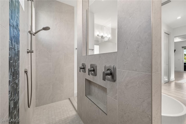 bathroom featuring plus walk in shower