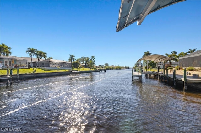 dock area featuring a water view