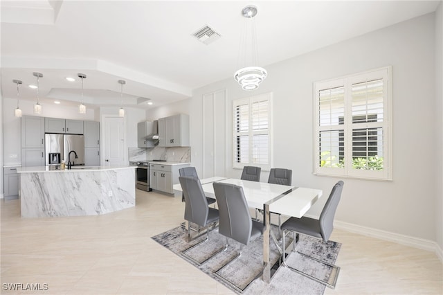 dining space with sink