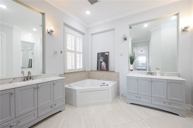 bathroom featuring vanity, a bathtub, crown molding, and tile patterned floors