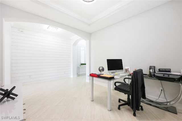 office with crown molding and a raised ceiling