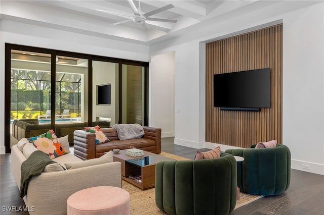 living room featuring coffered ceiling, hardwood / wood-style floors, beam ceiling, and ceiling fan