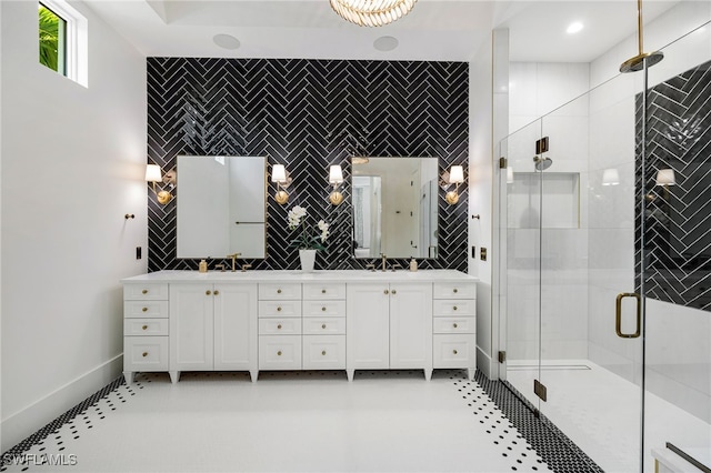 bathroom with vanity, tile walls, tile patterned floors, and walk in shower