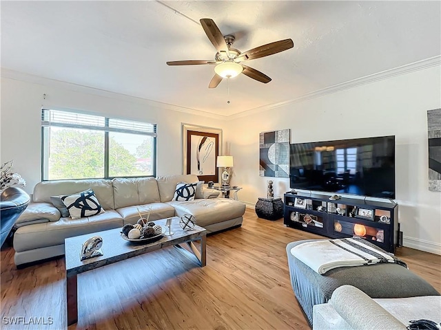 living room with crown molding, hardwood / wood-style floors, and ceiling fan