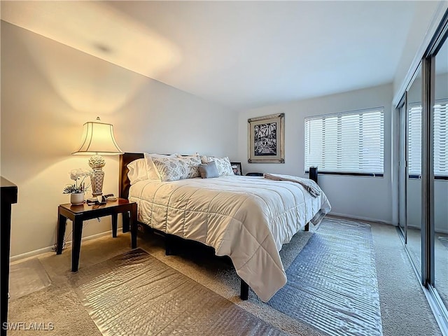 bedroom featuring light colored carpet