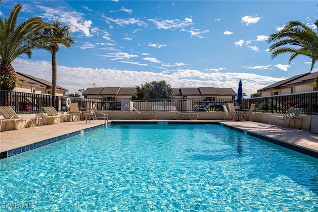 view of pool featuring a patio