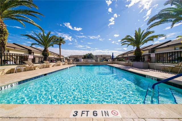 view of swimming pool featuring a patio