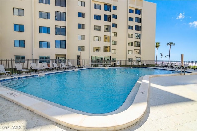 view of pool featuring a patio