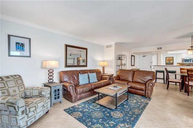 tiled living room featuring ornamental molding