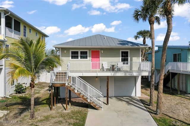 view of front of home with a garage and covered porch