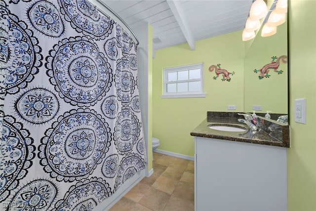 bathroom with vanity, vaulted ceiling with beams, toilet, and walk in shower