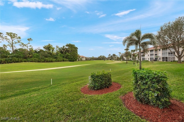 7025 Dennis Cir Unit G104, Naples, FL 34104 - view of home's community featuring golf course view and a yard