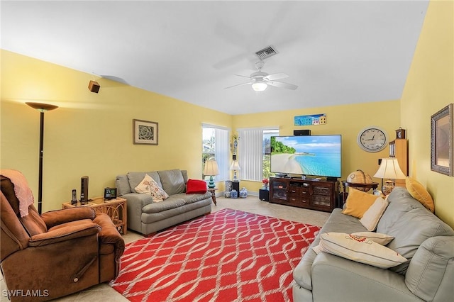 living room featuring ceiling fan