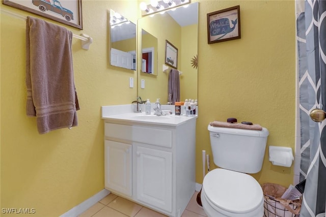 13380 Hampton Park Ct, Fort Myers, FL 33913 - bathroom featuring vanity, toilet, tile patterned flooring, and baseboards