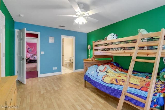 13380 Hampton Park Ct, Fort Myers, FL 33913 - bedroom featuring wood finished floors, baseboards, a ceiling fan, and connected bathroom