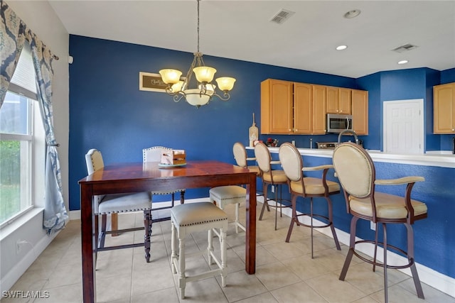 13380 Hampton Park Ct, Fort Myers, FL 33913 - dining room with a chandelier, baseboards, recessed lighting, and an accent wall