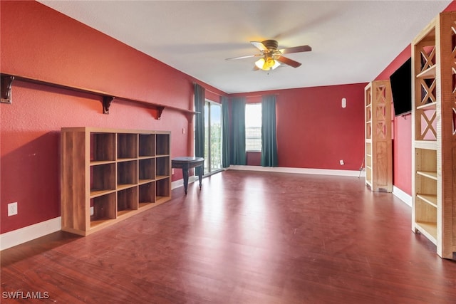 13380 Hampton Park Ct, Fort Myers, FL 33913 - unfurnished living room with ceiling fan, wood finished floors, and baseboards