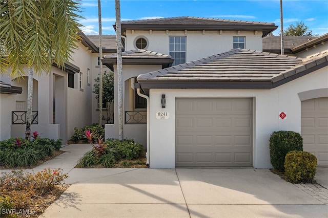 view of front of property with a garage