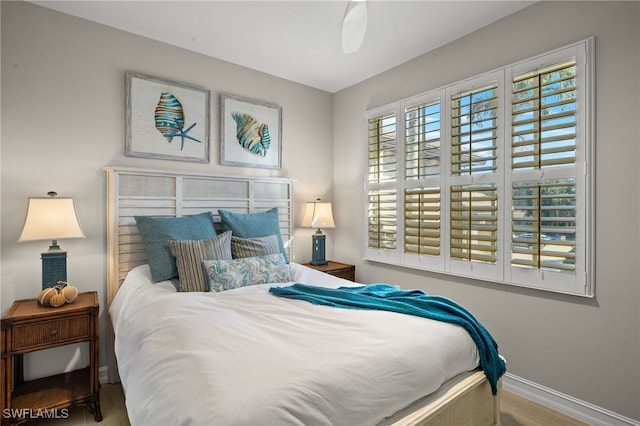 bedroom featuring hardwood / wood-style floors