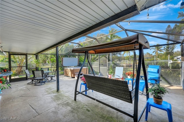 view of patio featuring an outdoor living space, a lanai, and a hot tub