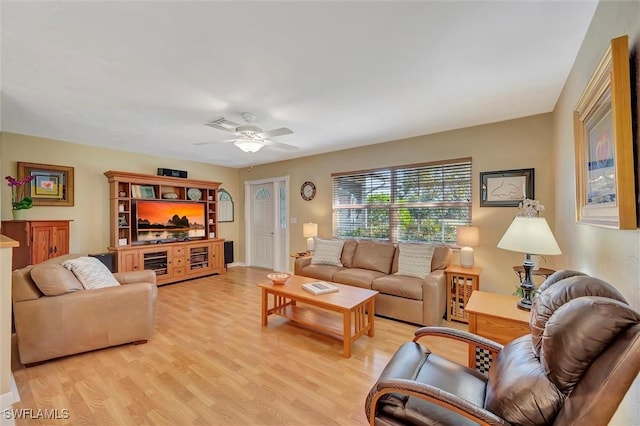 715 96th Ave N, Naples, FL 34108 - living room with light wood-style flooring and ceiling fan