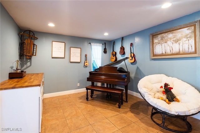 living area with light tile patterned floors