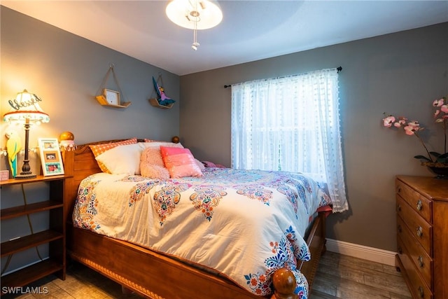 bedroom featuring hardwood / wood-style flooring