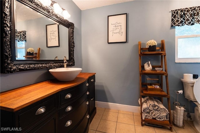 bathroom featuring tile patterned floors and vanity