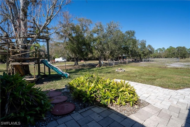 view of yard featuring a playground