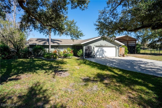 ranch-style home with a garage and a front lawn