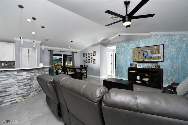 living room with ornamental molding, lofted ceiling, and ceiling fan