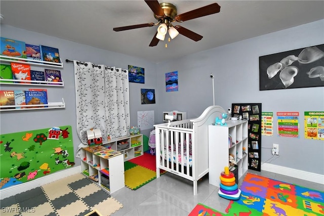 bedroom with light tile patterned floors and ceiling fan