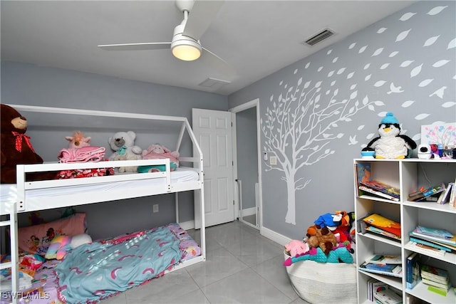 bedroom with light tile patterned flooring and ceiling fan