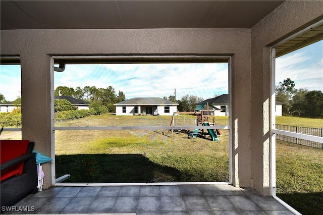 interior space with a patio area and a playground