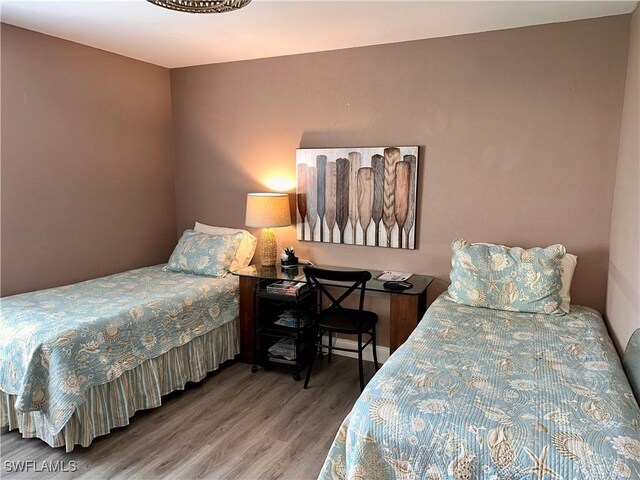 bedroom featuring hardwood / wood-style floors