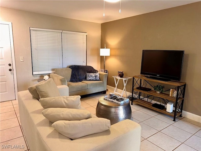 living room with tile patterned flooring