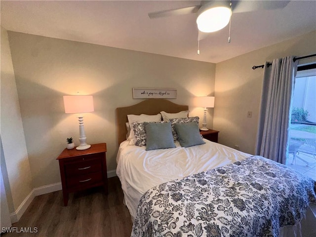 bedroom featuring a ceiling fan, baseboards, and wood finished floors