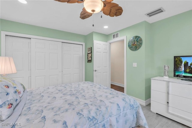 bedroom with a closet and ceiling fan