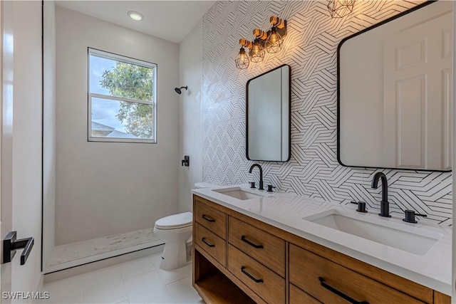 4273 18th St NE, Naples, FL 34120 - full bathroom with toilet, double vanity, backsplash, recessed lighting, and tile patterned floors