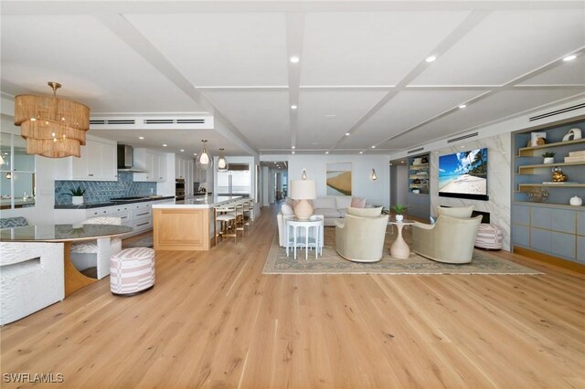 unfurnished living room featuring light hardwood / wood-style flooring